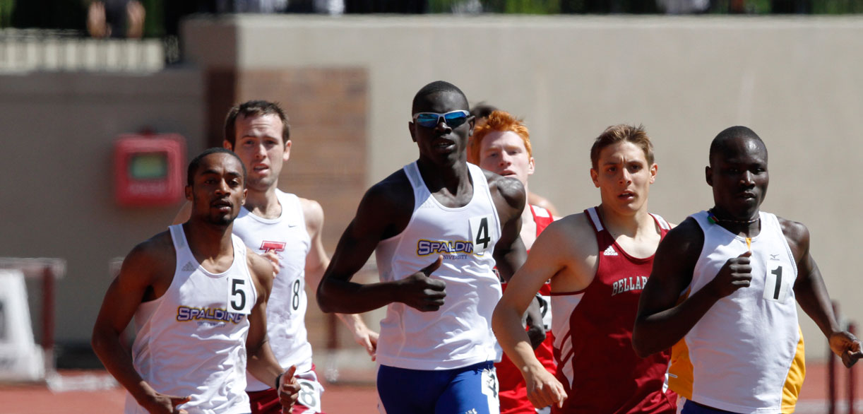 Spalding student-athlete Abram Deng running mid-pack at track meet.