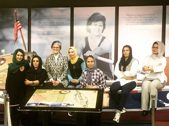 President McClure and female athletes from Afghanistan with the American Pearl