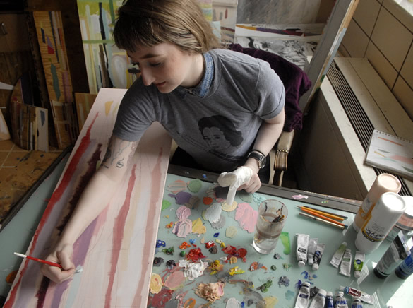 Student works on art in studio
