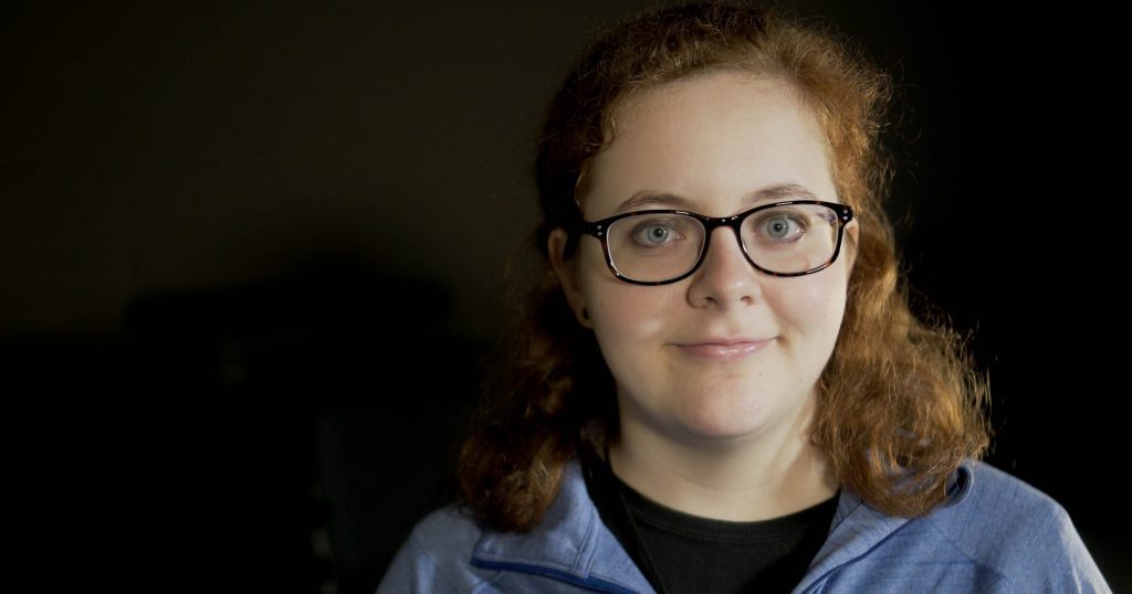 Head shot of Spalding student Allison Campbell in front of a black background