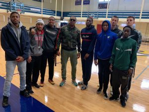 Rapper Percy Miller, aka Master P, posed with Spalding student-athletes on Feb. 8, 2019