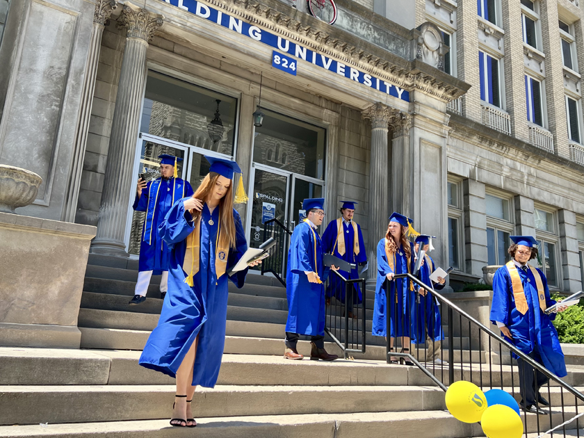 Spalding grads exiting Columbia Gym after ceremony