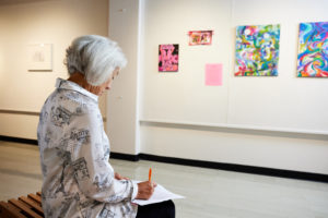 Spalding MFA Writing student in Huff Gallery