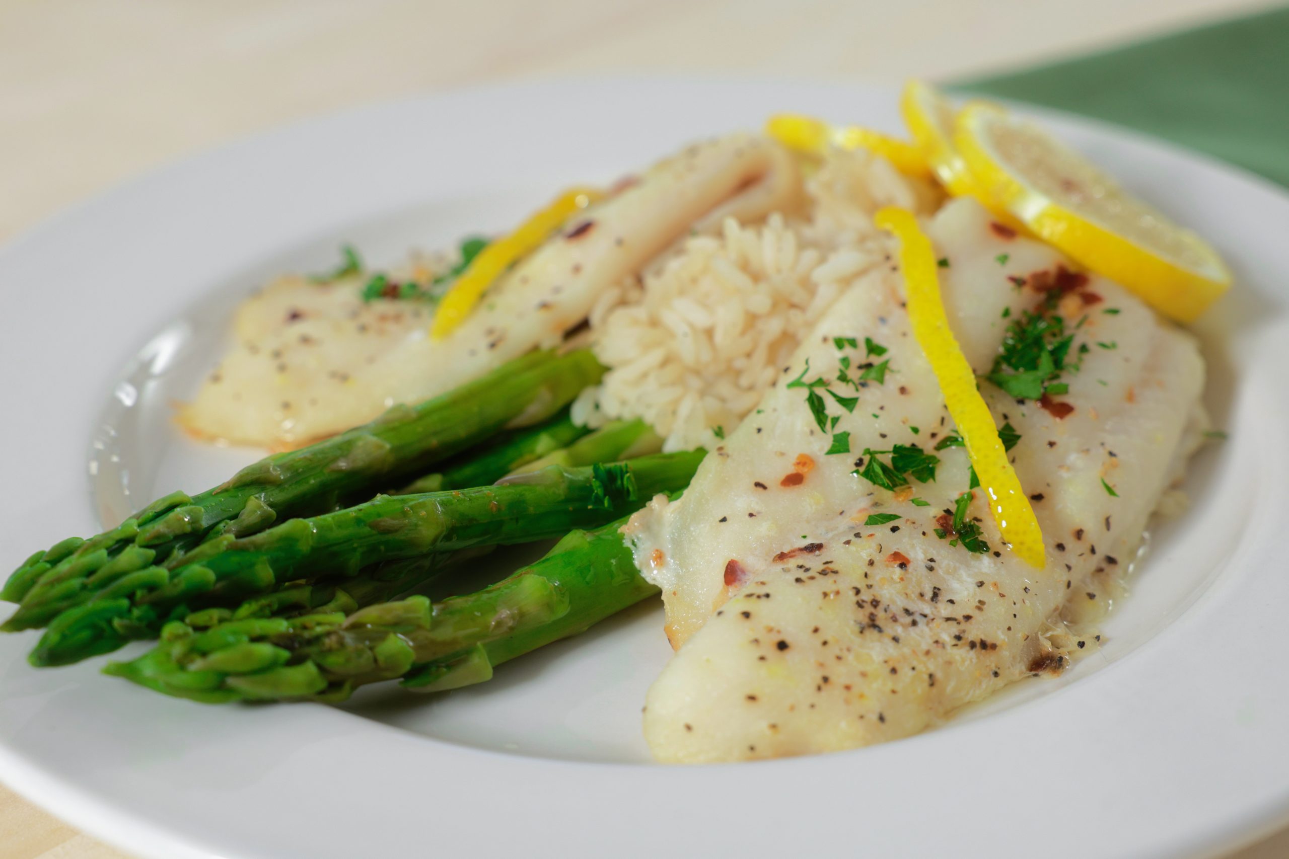 Fish, rice, and asparagus