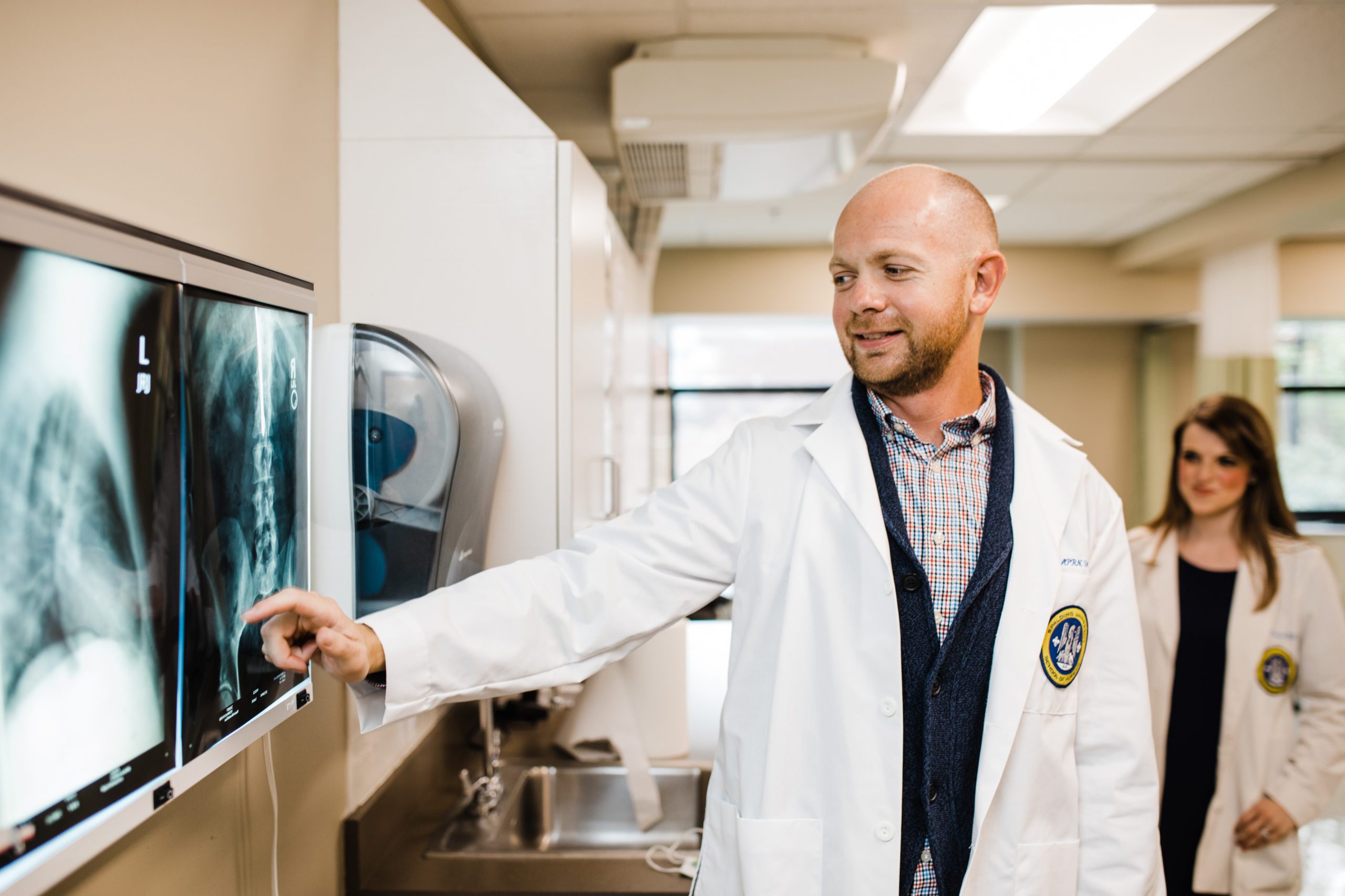 Spalding student pointing at x-ray