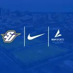 Spalding University, NIKE, and BSN SPORTS logos overlaid on blue transparent background on top of image of SU athletics fields.