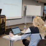 a student on her laptop