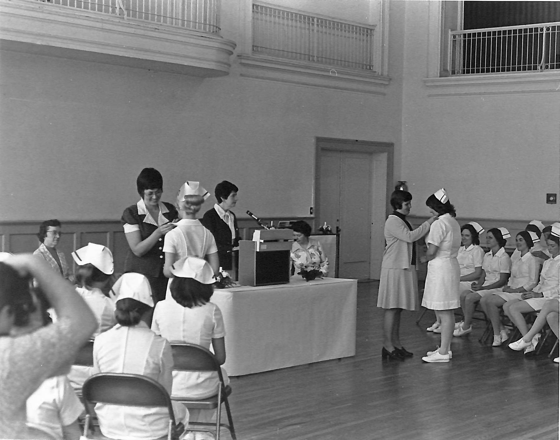 black and white photo from 1976 nursing pinning ceremony